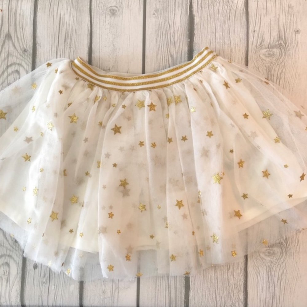 Tutu w/white tulle & gold star accents.
